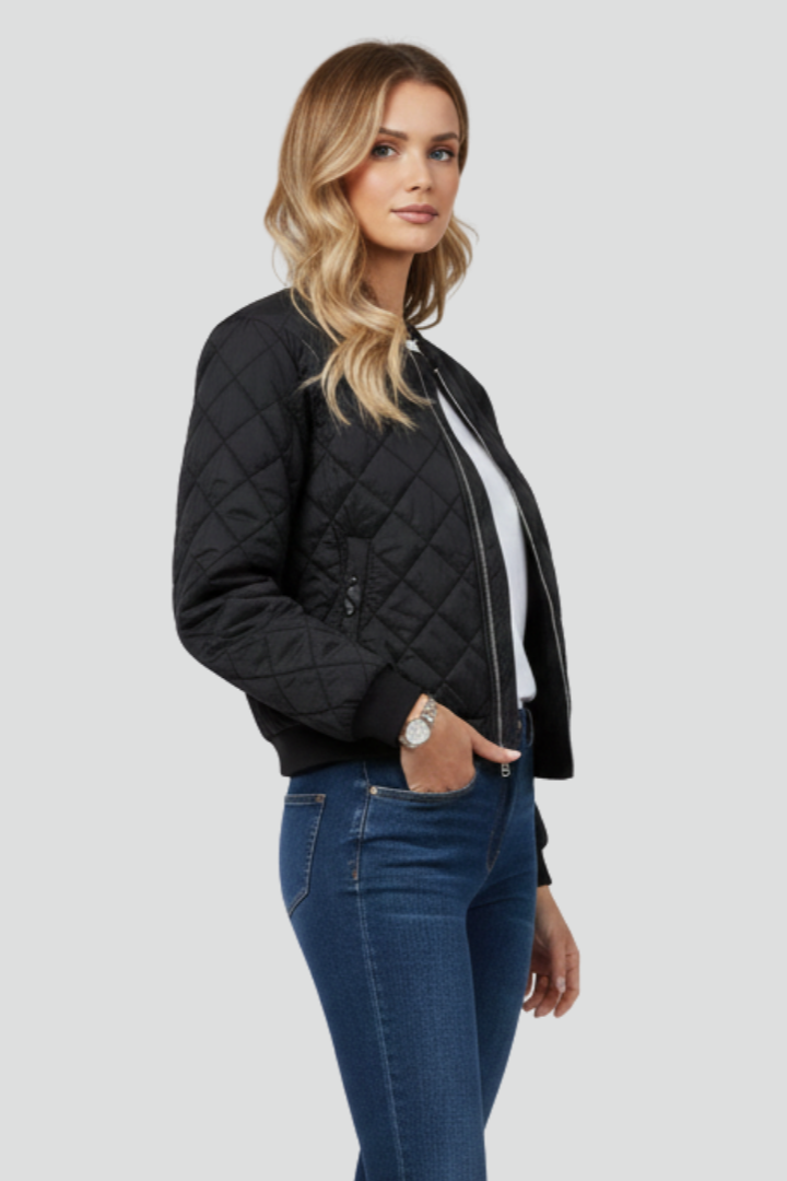 Versatile women's quilted zip jacket for fall & winter. Relaxed fit casual outerwear, ideal for layering everyday.