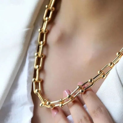 Women's Radiant Gold Link Chain Necklace & Bracelet Jewelry Set, elegant fashion accessory.
