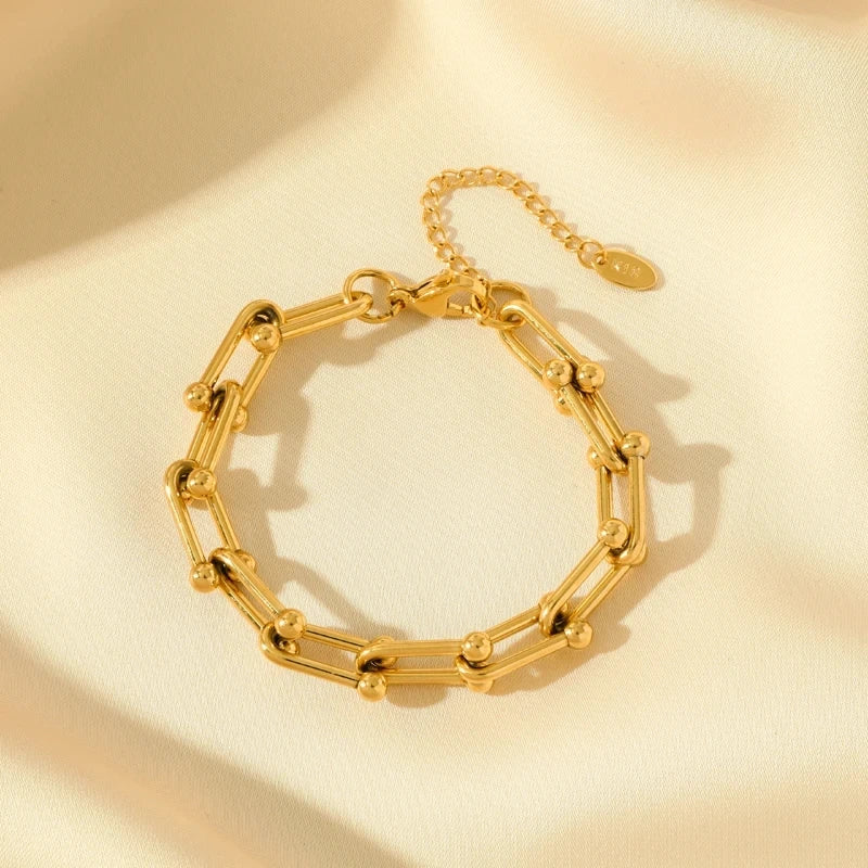 Radiant gold link chain bracelet, a stylish accessory from the women's jewelry set.