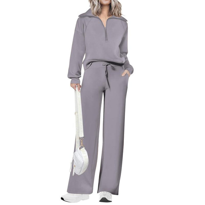 Women's half-zip top & wide-leg pant two-piece set. Casual, comfortable, and stylish matching outfit.