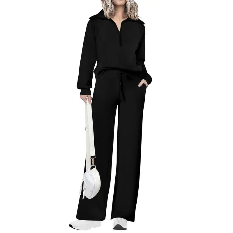 Chic women's lounge wear set. Comfortable half-zip top and wide-leg pants, perfect for casual style.