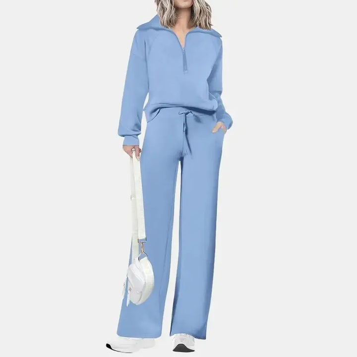 Comfortable women's half-zip two-piece set with wide-leg trousers. Chic casual matching lounge wear.
