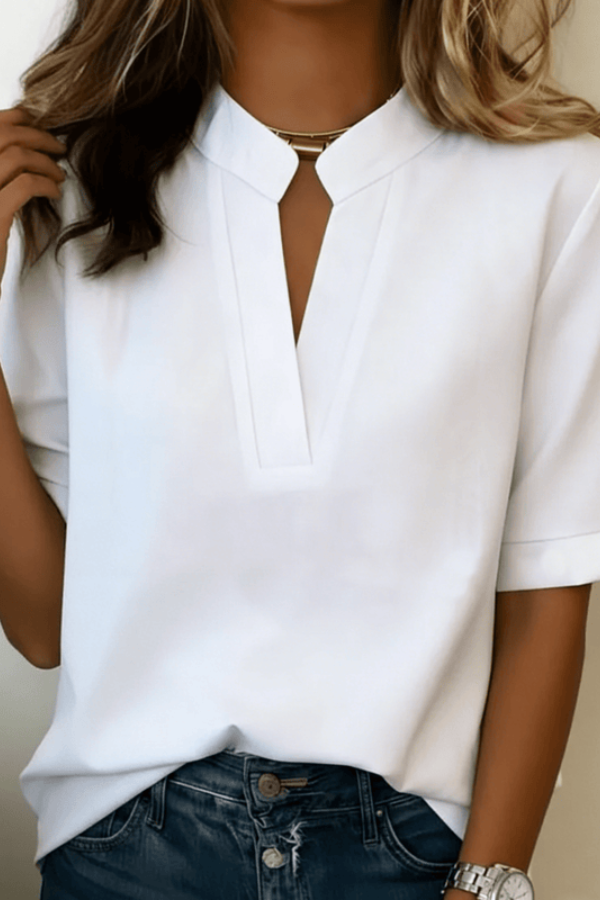 Women's V-neck blouse with long sleeves, offering comfortable and effortless style for office or everyday wear.