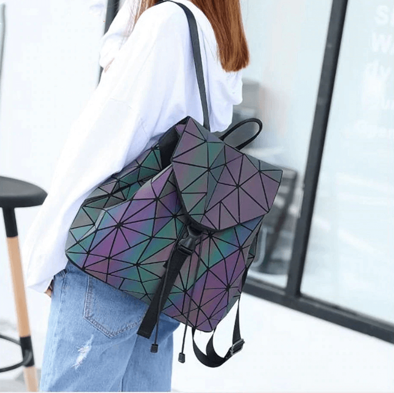 Holographic geometric women's backpack, luminous and reflective, a unique fashion statement.