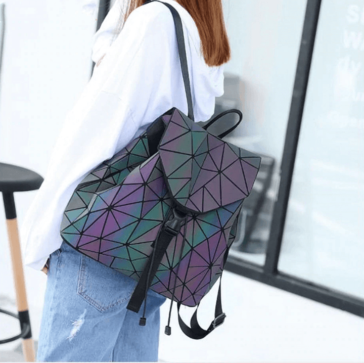 Holographic geometric women's backpack, luminous and reflective, a unique fashion statement.