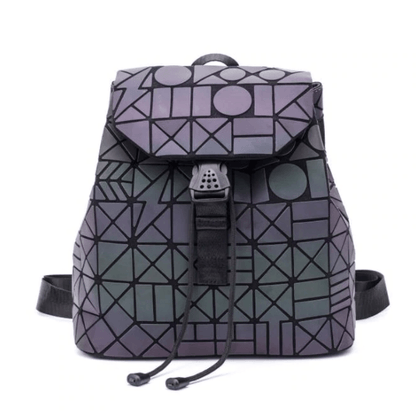Back view of a woman wearing a geometric color-changing backpack, showcasing reflective safety.