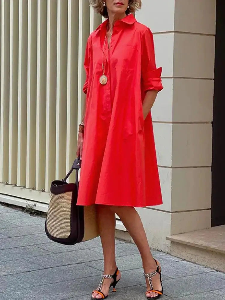 Versatile women's midi shirt dress with relaxed A-line fit & full button-front, ideal for work or casual style.