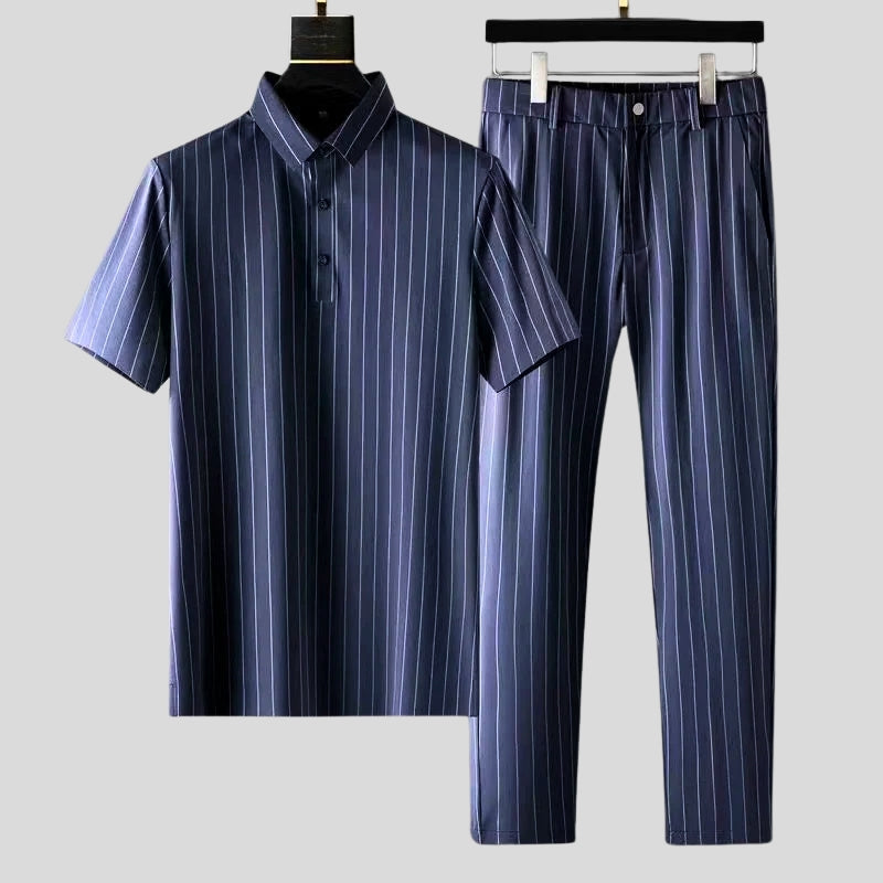Women's relaxed blue two-piece lounge set. Tailored fit short-sleeve top & pants for comfortable, versatile casual wear.