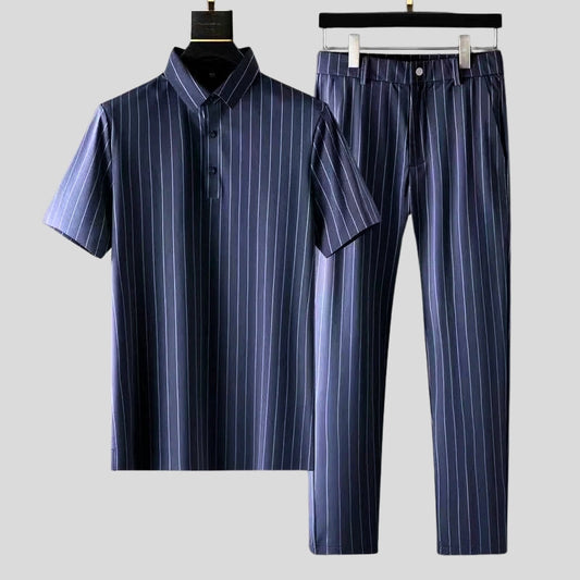 Women's relaxed blue two-piece lounge set. Tailored fit short-sleeve top & pants for comfortable, versatile casual wear.