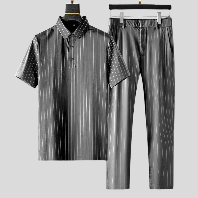 Gray women's relaxed two-piece loungewear set. Tailored fit, short-sleeve top & pants for a chic, comfy casual outfit.