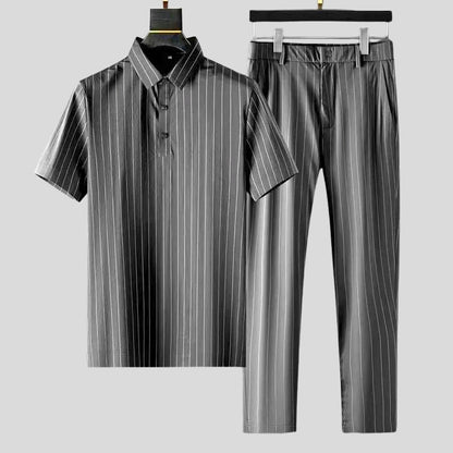 Gray women's relaxed two-piece loungewear set. Tailored fit, short-sleeve top & pants for a chic, comfy casual outfit.