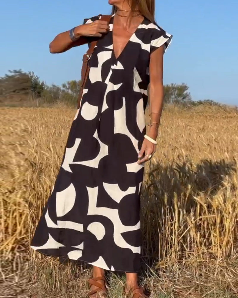 Casual women's abstract printed dress with a comfortable, flowy design, ideal for summer.