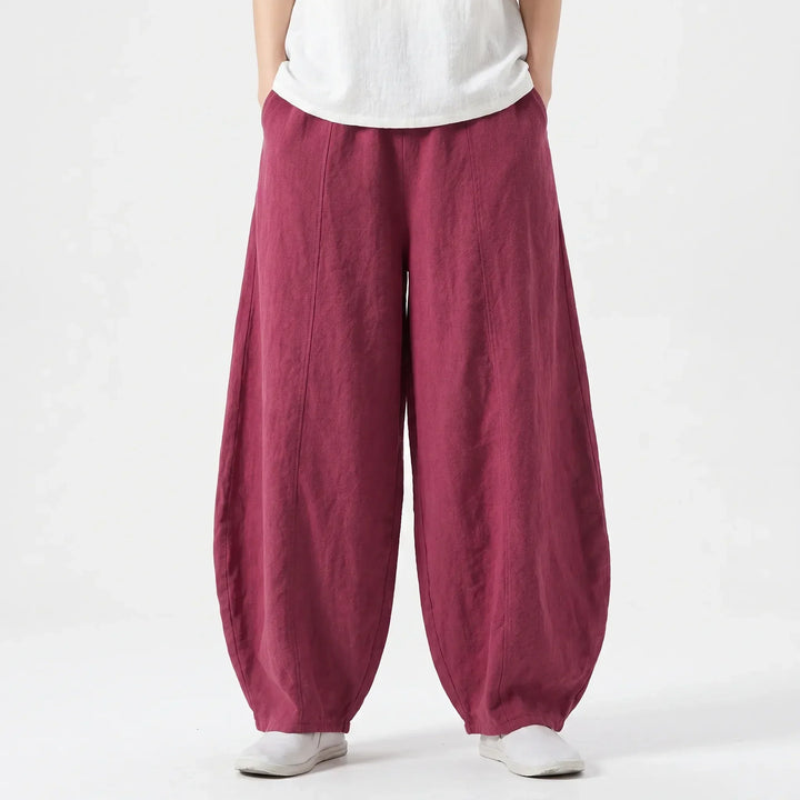 Women's relaxed fit barrel pants with functional pockets, comfortable wide leg design.