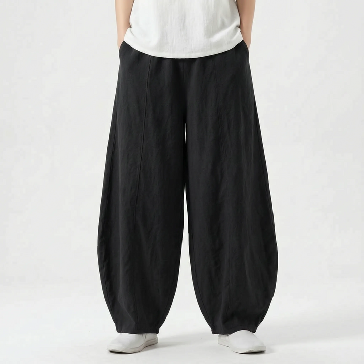 Effortless women's barrel trousers, relaxed wide leg fit for all-day comfort & style.
