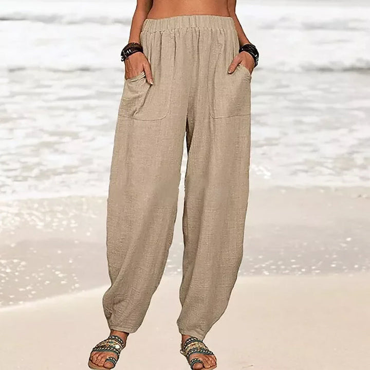 Flowy bohemian style women's harem pants, perfect loose fit beachwear for summer comfort & vacation.