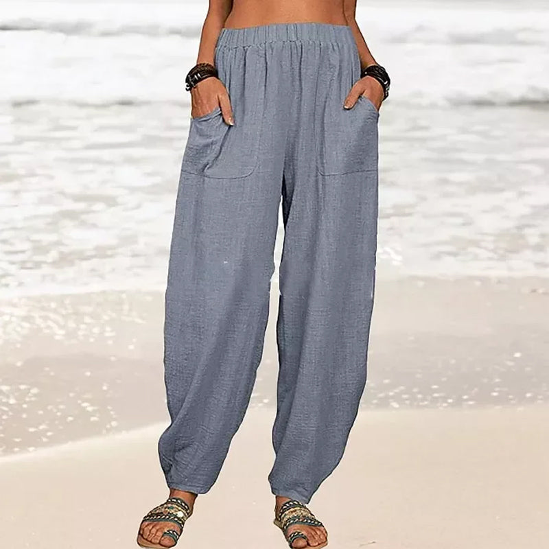 Comfortable women's wide-leg harem pants, ideal for summer fashion, beach trips, and casual relaxed style.