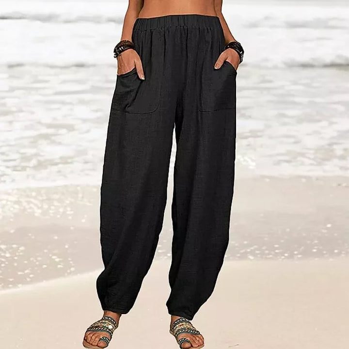 Relaxed fit women's harem pants, a versatile summer fashion choice for beachwear & bohemian comfort.