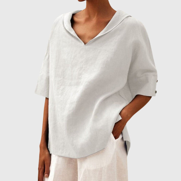 Chic women's loose fit blouse, ideal for effortless everyday fashion & comfortable spring wear.