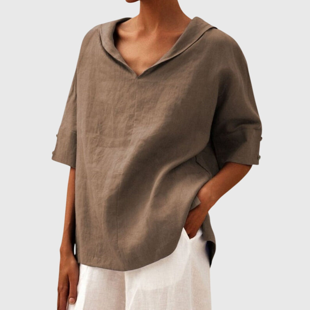 Comfortable women's relaxed fit blouse, a versatile summer top for casual, chic everyday outfits.