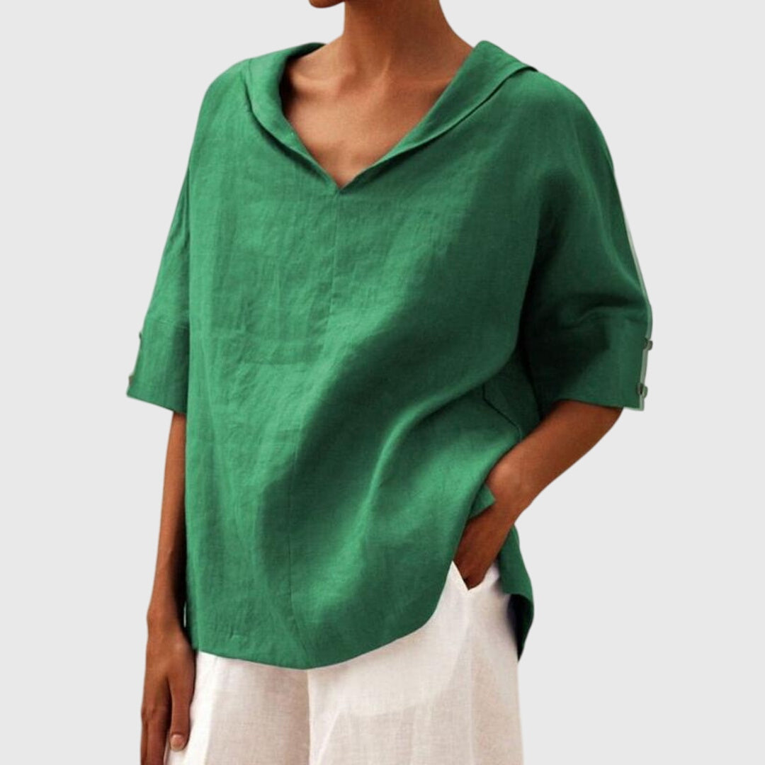 Versatile women's relaxed fit blouse, a key spring fashion piece for comfortable, chic everyday wear.