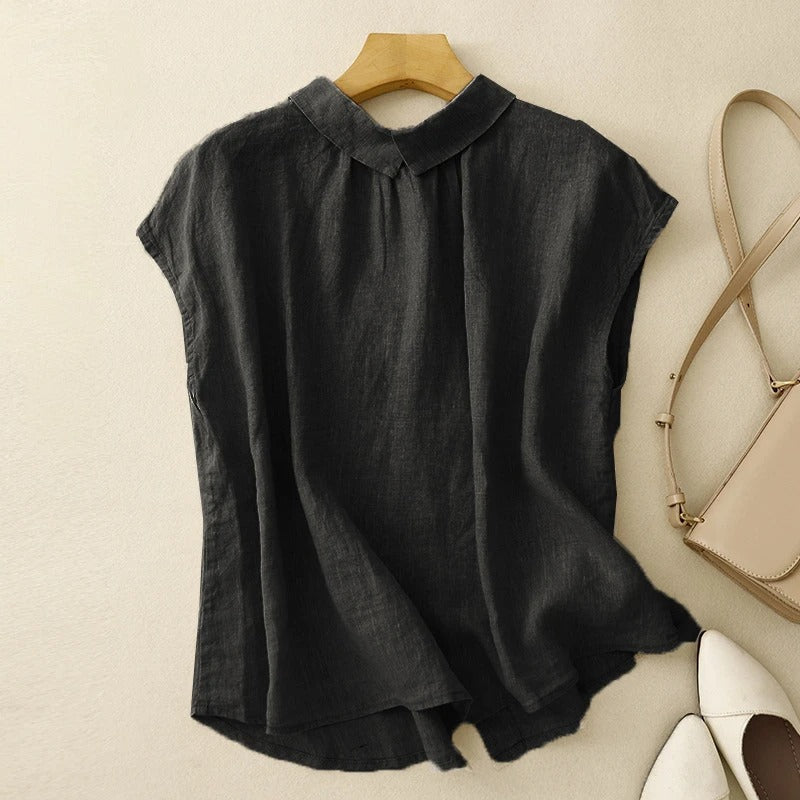 Women's relaxed fit blouse with sculpted collar & capped sleeves. Elegant spring/summer top.