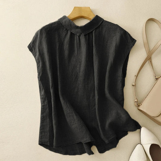 Women's relaxed fit blouse with sculpted collar & capped sleeves. Elegant spring/summer top.