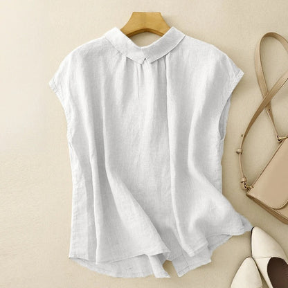 White women's relaxed fit shirt. Summer blouse with sculpted collar & capped sleeves.