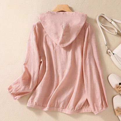 Women's long sleeve relaxed fit hoodie with button front, breathable for seasonal transition.