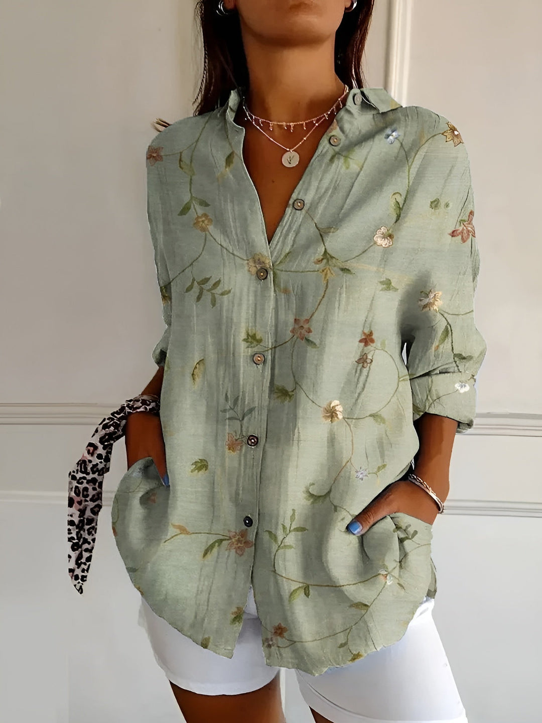 Women's relaxed fit button-down blouse, long sleeves & v-neck. Casual or professional work wear.