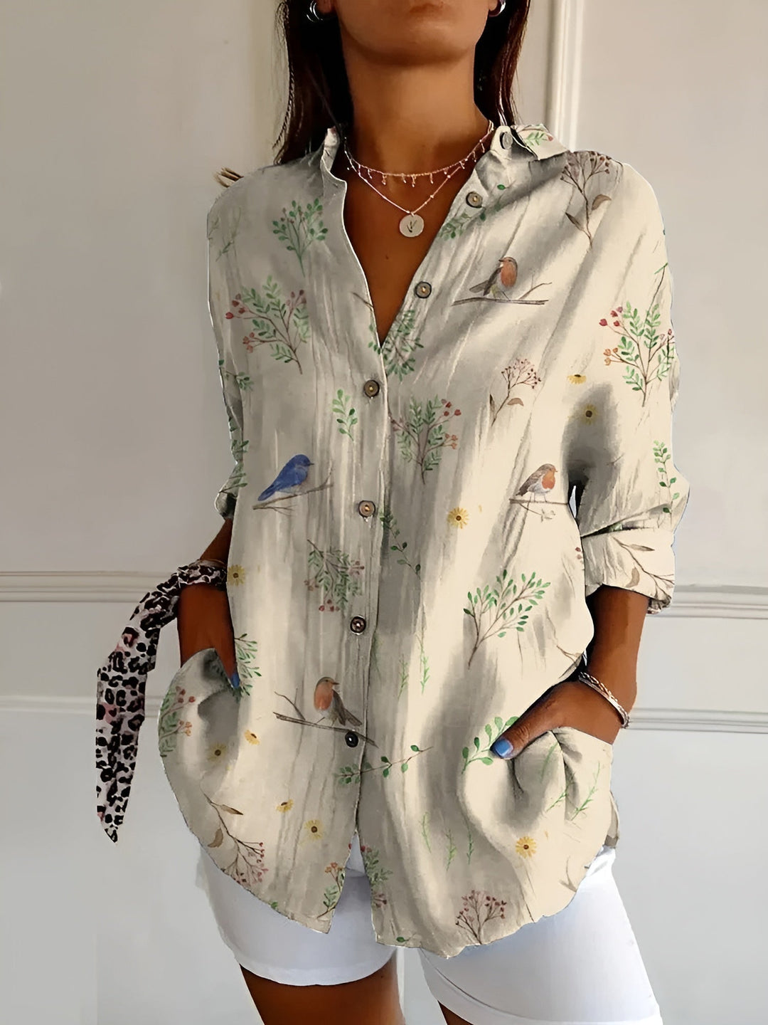 Casual women's blouse with relaxed fit & button-down front. Comfortable everyday long sleeve top.
