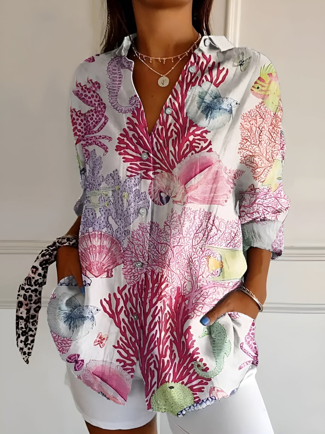 Effortless style: Women's versatile long-sleeve blouse with a flattering v-neck and relaxed fit.