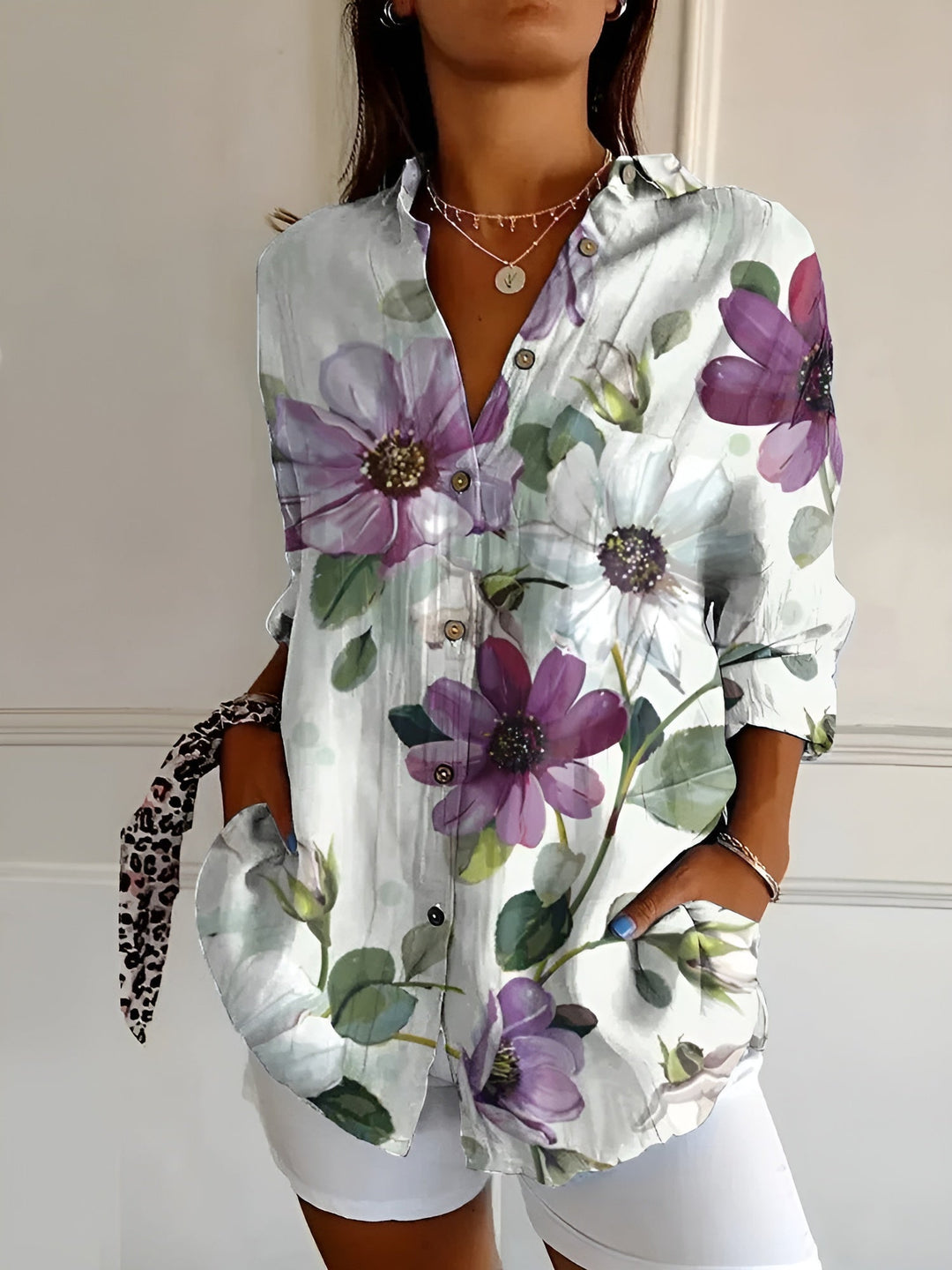 Women's v-neck button-down blouse, a relaxed fit long-sleeve shirt for versatile everyday fashion.