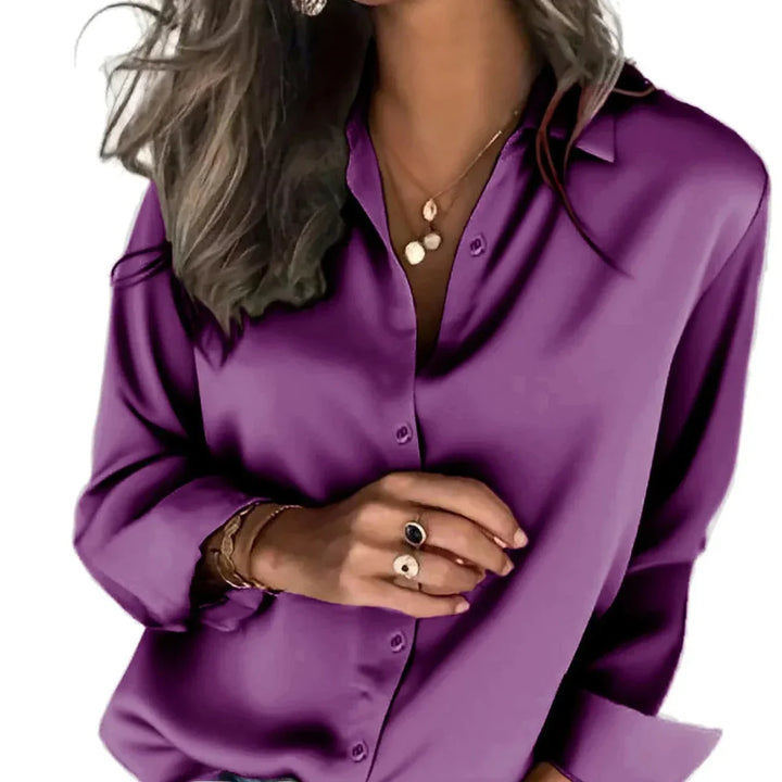 Women's relaxed fit button down shirt, a comfortable long-sleeve top for effortless, versatile style.