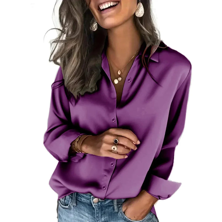 Chic women's long-sleeve relaxed fit button down, perfect for a sophisticated yet comfortable outfit.