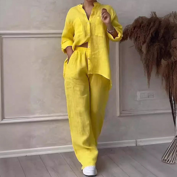 Coordinated two-piece women's clothing set with a relaxed button-down shirt & wide-leg pants.