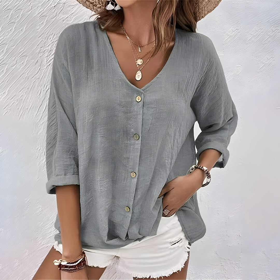 Classic collared women's button-up blouse with long sleeves. Relaxed fit, breathable & versatile for any occasion.