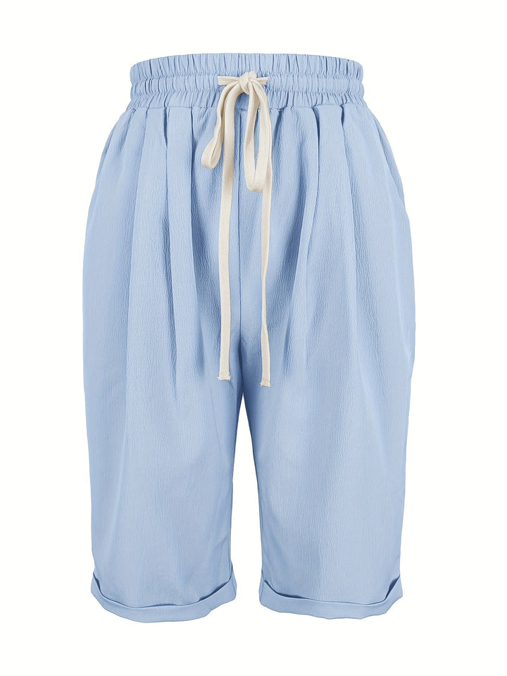 Casual women's capris with elastic waist and relaxed fit, great for everyday summer outfits.
