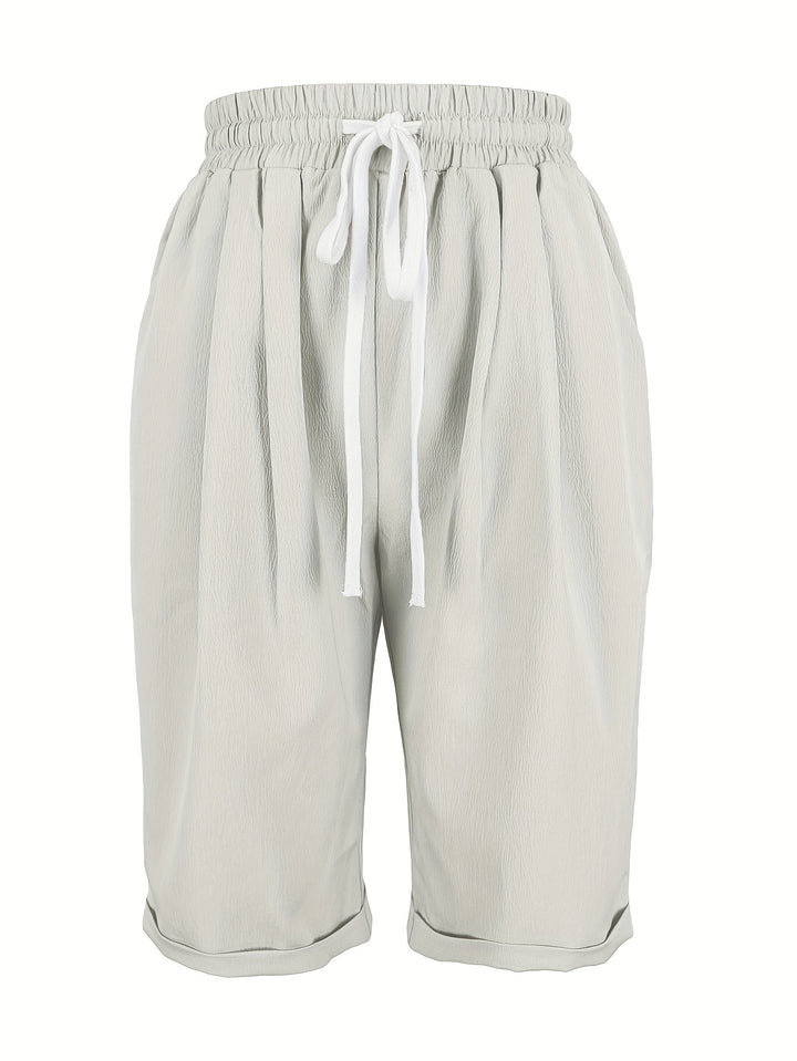 Versatile women's capris, relaxed fit, elastic waist, perfect pull-on pants for summer days.