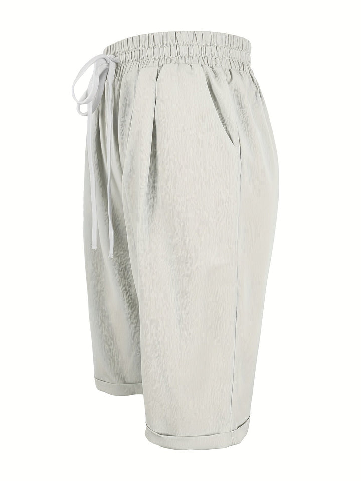 Everyday women's mid-calf capri trousers, relaxed fit, elastic waist for casual comfort.
