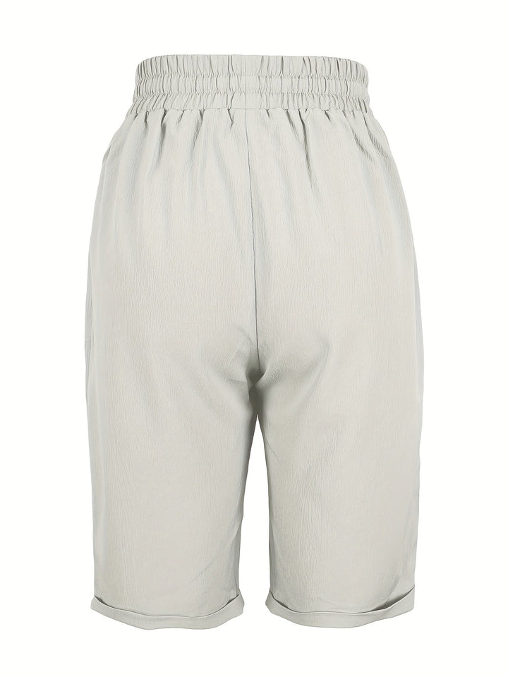 Summer women's relaxed fit capris with elastic waist, offering comfortable and versatile style.