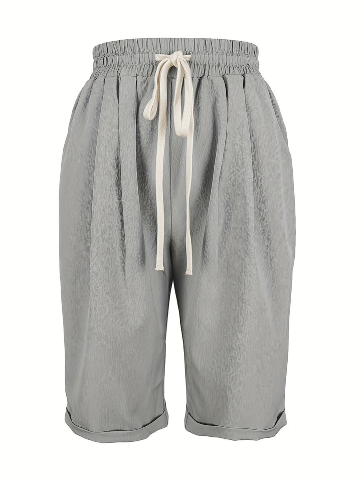 Women's pull-on capri trousers, relaxed fit, elastic waist, ideal for comfortable warm weather casual wear.