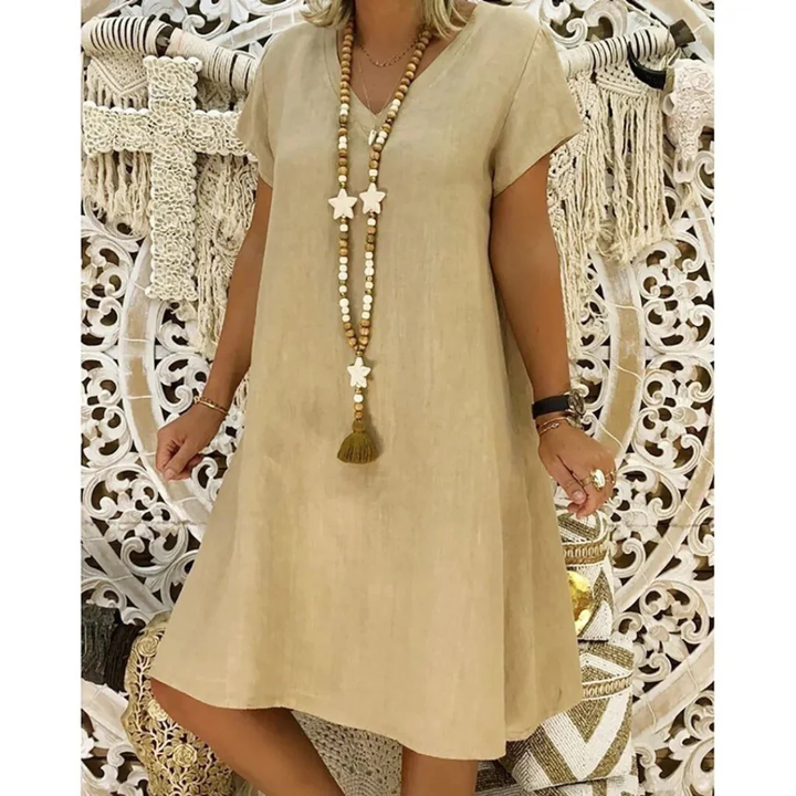 Women's relaxed fit casual summer dress. Comfortable everyday wear, perfect for warm weather. Plus size available.