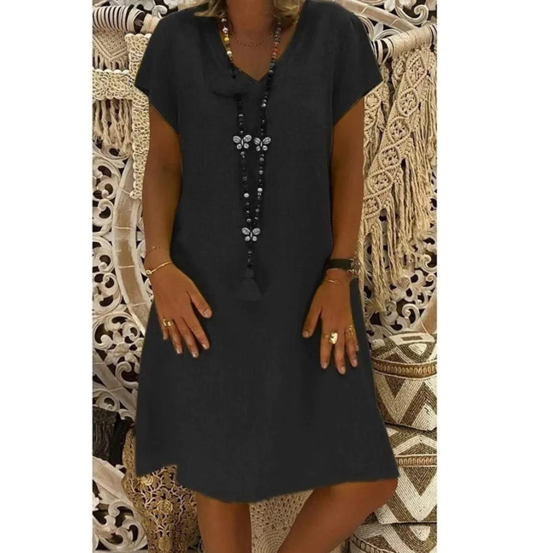 Comfortable women's relaxed fit summer dress. Ideal for everyday casual wear, available in vibrant colors and plus sizes.