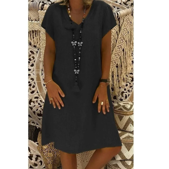 Comfortable women's relaxed fit summer dress. Ideal for everyday casual wear, available in vibrant colors and plus sizes.