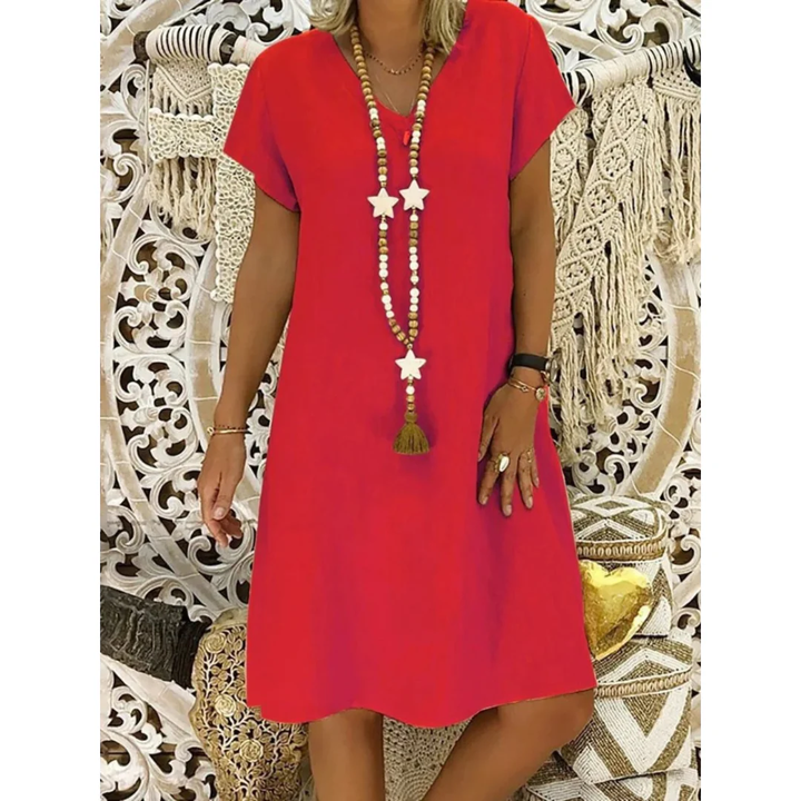 Plus size women's relaxed fit summer dress. Comfortable casual wear for everyday fashion, perfect for warm weather.