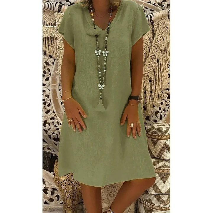Full-length view of a women's relaxed fit summer dress. Casual & comfortable for warm weather everyday fashion. Plus size.