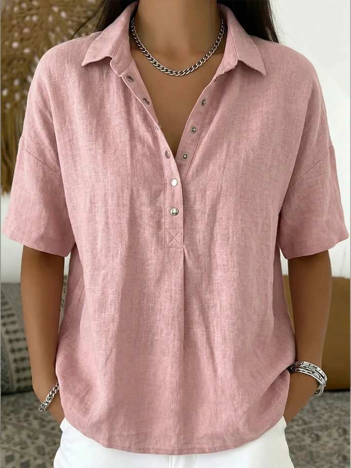Versatile women's button detail relaxed fit shirt, great for summer fashion and easy styling.