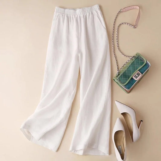Women's relaxed fit cotton-linen blend trousers with an elastic waist, perfect for breathable comfort in summer.