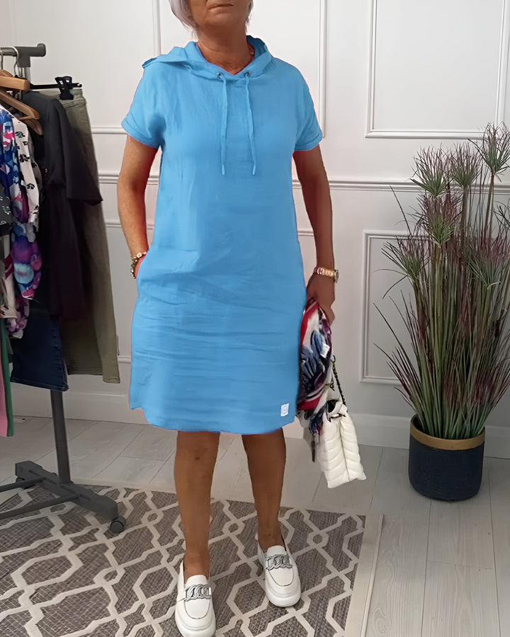 Everyday comfort in this women's relaxed fit hoodie midi dress with an adjustable hood & soft fabric.