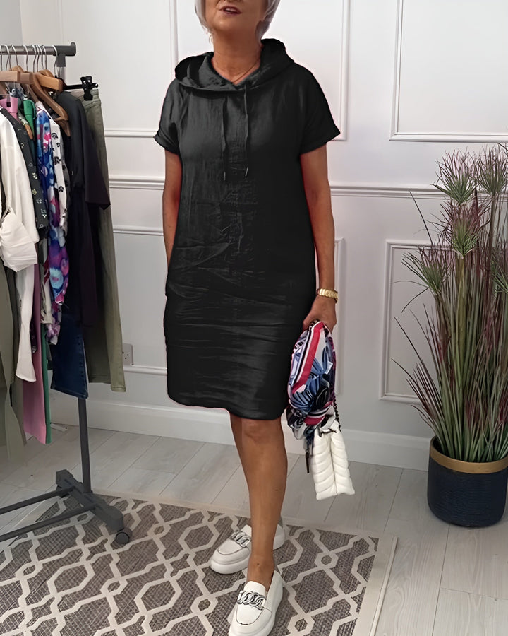 Relaxed fit women's hoodie midi dress, comfy & casual, with an adjustable hood for leisure.
